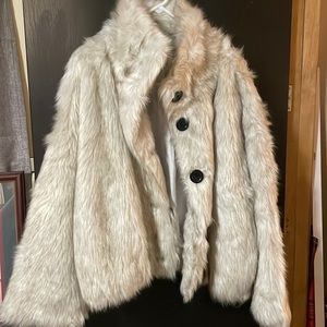 Fur type coat. Very cute but never worn.